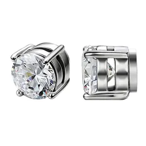 Detailed view of clear round zircon magnetic studs with silver four-prong setting