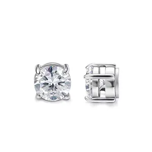 Macro shot of cubic zirconia stud earrings with classic four-claw setting in silver