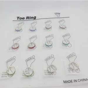 12-piece set of colorful rhinestone toe rings with silver base on display card