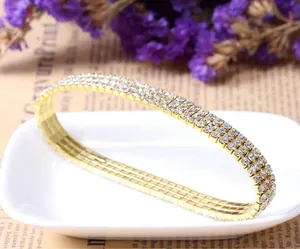 Bracelet de cheville extensible doré à trois rangées de cristaux brillants
