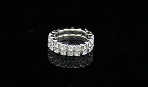 Close-up of double row crystal stretch ring with silver finish and transparent stones