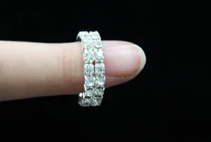 Detail of silver double row rhinestone elastic ring showing side profile and stone setting