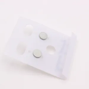 Minimalist silver round magnetic stud earrings set displayed on a white tray