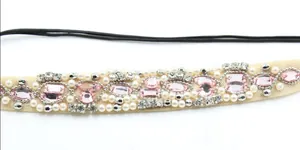 Handmade headband featuring pink marquise crystals and pearls on beige mesh band