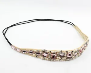 Handmade pink crystal and white pearl headband with elegant rhinestones and elastic band
