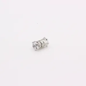 Macro shot of silver magnetic stud earring with round white cubic zirconia stone