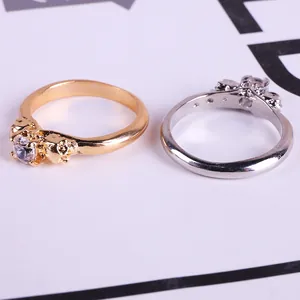 Gothic skull rings in gold and silver finish with round crystal zircon center stones
