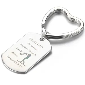 Polished stainless steel keychain for dad featuring a heart ring and engraved rectangular tag