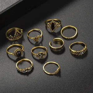 10-piece vintage gold bohemian ring set with moon star patterns and black gems