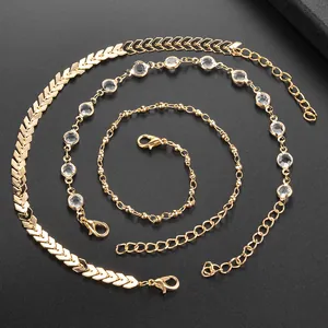 Three-layer golden fishbone anklet set with sparkling crystals and lobster clasp