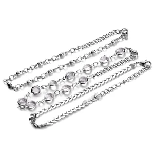 Detail of silver layering bracelet set with crystal inlay and herringbone chain patterns