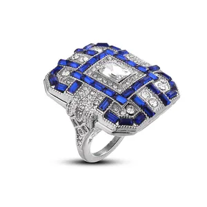 Anello Art Déco con grande cristallo blu e zirconi geometrici scintillanti