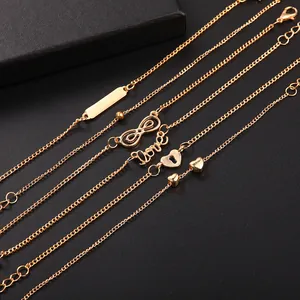 Five-piece gold infinity heart and love charm anklet set for women with lobster clasp