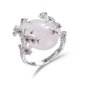 Floral branch ring with white opal and pink zircon accents in silver finish