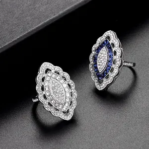 Vintage marquise-cut crystal ring with blue sapphire accents and silver finish