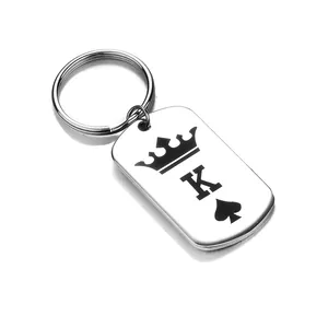 Llavero de acero inoxidable pulido con diseño de corona King K y pica negra