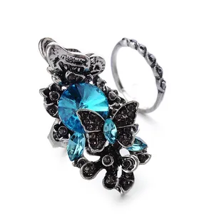 Vintage silver butterfly ring set with blue crystal and pavé black rhinestones