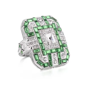 Art Deco square cocktail ring in silver with green emerald stones and white zircon