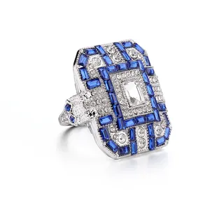 Art Deco silver ring with large rectangular blue crystal and sparkling zircons