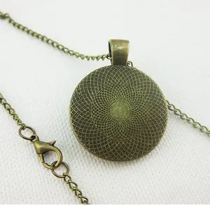 Vintage bronze zodiac pegasus necklace with round pendant and textured geometric back