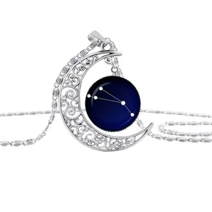 Celestial crescent moon necklace with blue 12 constellations pendant on white background