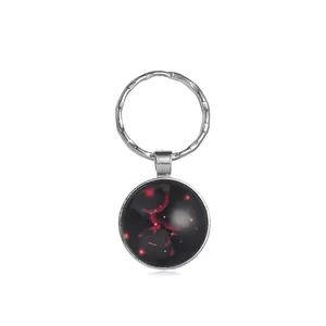 Detalle del llavero del zodiaco Cáncer con colgante de vidrio y aleación de plata