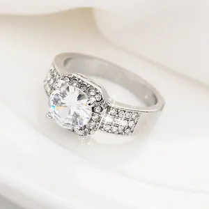Elegant halo crystal zircon ring with round center stone and pave set wide band in silver