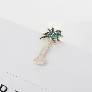 Tropical coconut palm tree brooch pin in gold plating and deep green enamel finish