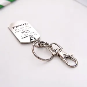 Engraved stainless steel DAD keychain with sentimental quote on a clean white background