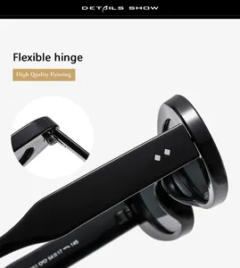 Detail showing high quality flexible hinge and metallic rivets on black oval sunglasses