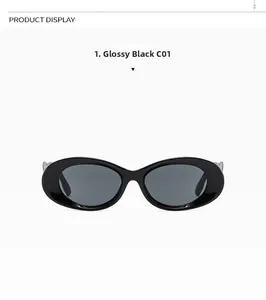 Detail view of oval bright black sunglasses with dark grey lenses in a minimalist frame