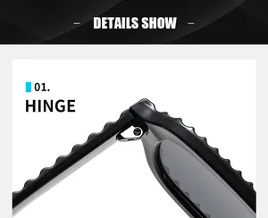 Gros plan sur la charnière métallique et les branches ondulées des lunettes de soleil noires
