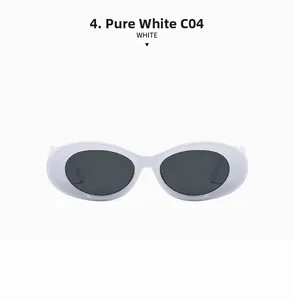 Detail view of oval white sunglasses with dark grey lenses in hip-hop style