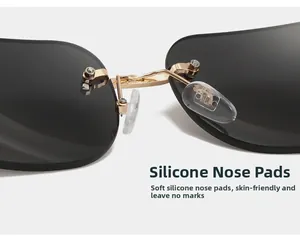 Close-up of soft silicone nose pads and metal bridge on rimless butterfly sunglasses