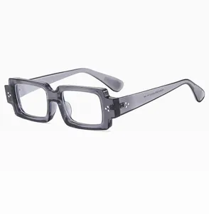 Detail view of transparent grey square frame with silver dots and interior size marks