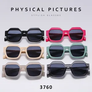 Flat lay of stylish geometric polygon sunglasses in six assorted colors with UV protection