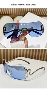 Detail of silver rimless sunglasses with blue lenses and wavy metal temples