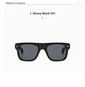 Detail view of glossy black square frame polarized sunglasses with silver metal rivets