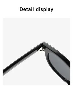 Macro shot of high-quality metal hinge and engraved size parameters on black frames