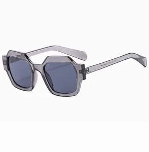 Detail view of transparent grey polygonal sunglasses with professional size markings