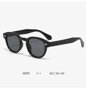 Detail view of model 8101 retro round black sunglasses with silver diamond rivets