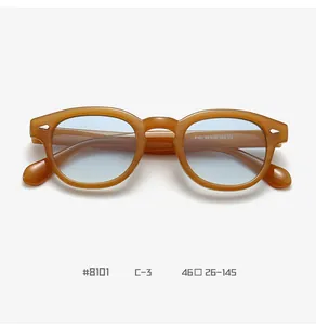 Macro detail of amber round eyeglass frame showing inner temple model 8101 specs