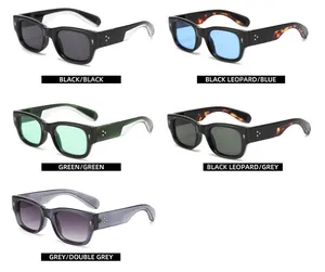 Detailed flat lay of rectangular vintage sunglasses in five color variants with metal rivets