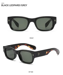 Detail view of narrow black sunglasses with leopard print temples and metal rivets