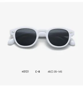 Detail view of oval white acetate sunglasses with silver rivets and UV lenses #8101