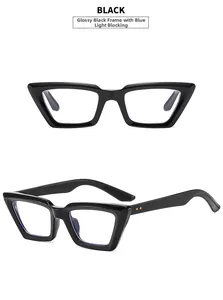 Detail of glossy black cat-eye frames with metal rivets and anti-blue light lenses