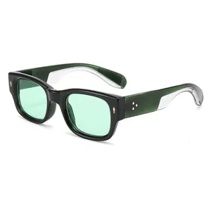Deep green rectangular sunglasses with light green lenses and gold rivet accents