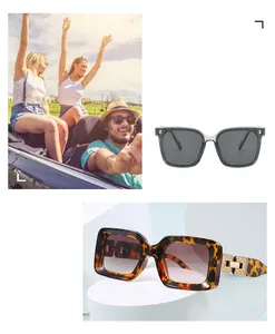 Detail of tortoiseshell square sunglasses featuring wide gold metal hollow temples