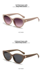 Detailansicht der Retro-Cat-Eye-Sonnenbrille in Pink und Tee mit goldenen Metallakzenten