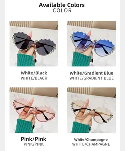 Detail of rimless wavy-cut sunglasses with rhinestone accents in four stylish colors